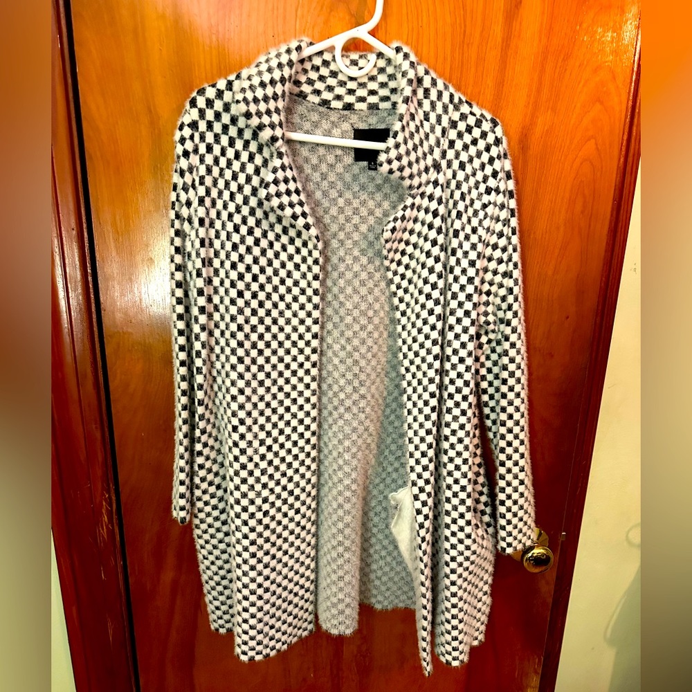 Liverpool Jacket- goes past the knee, very soft and cozy. Has pockets